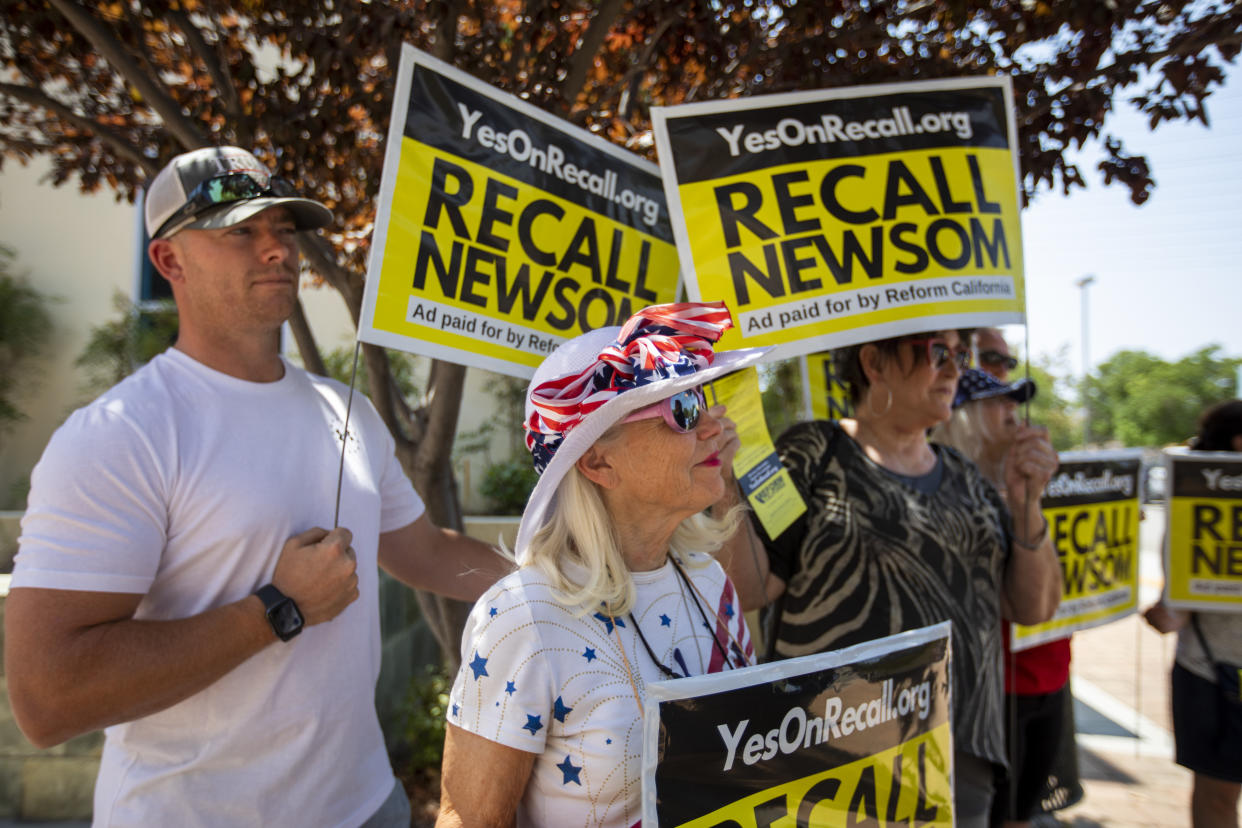 Vicky Abramson, middle, of Valencia is attending  a rally at the Santa Clarita Activities Center on Sunday, Aug. 15, 2021 in SANTA CLARITA, CA. (Francine Orr/Los Angeles Times via Getty Images)