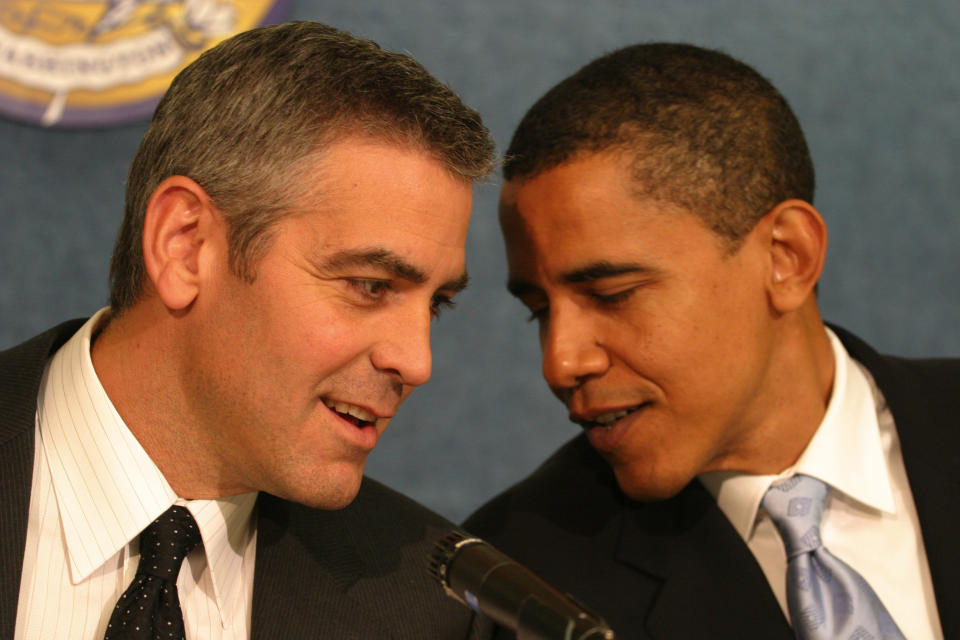 UNITED STATES - APRIL 27:  National Press Club's Newsmaker Program. Academy Award Winner George Clooney discusses his recent visit to War-torn darfur. And he released his video footage from his trip to Sudan with his father PICTURED: George Clooney, left, talks to Barack Obama, (D-IL) before the press conference.  (Photo by Sarah L. Voisin/Washington Post/Getty Images)