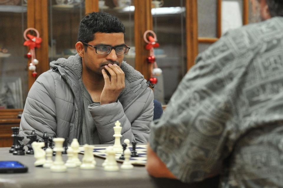 Sujidh Mahendrakar, of Quincy, ponders his next move during the first night of the Quincy Chess Club at Bethany Congregational Church in Quincy on Wednesday, Jan. 3, 2024.