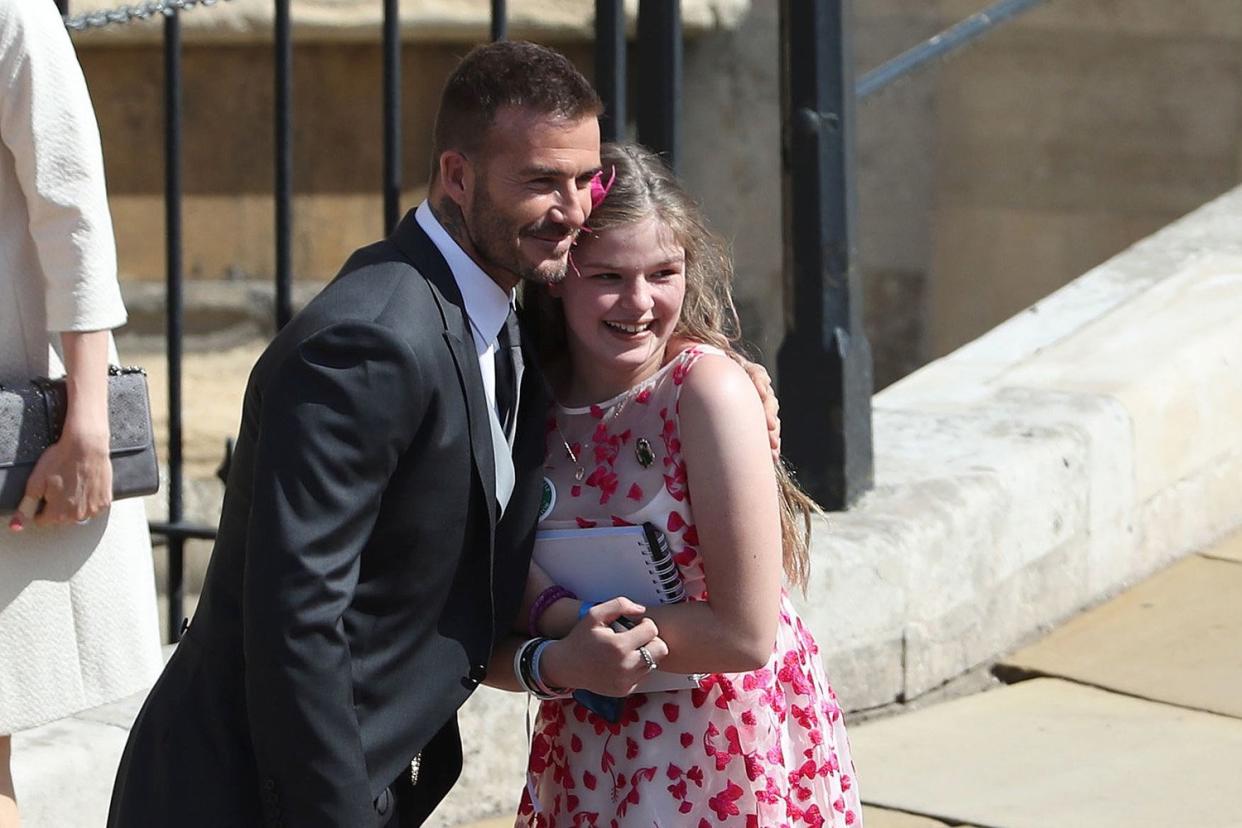 Heart-warming: David Beckham poses with Amelia Thompson: ANDREW MILLIGAN/AFP/Getty Images