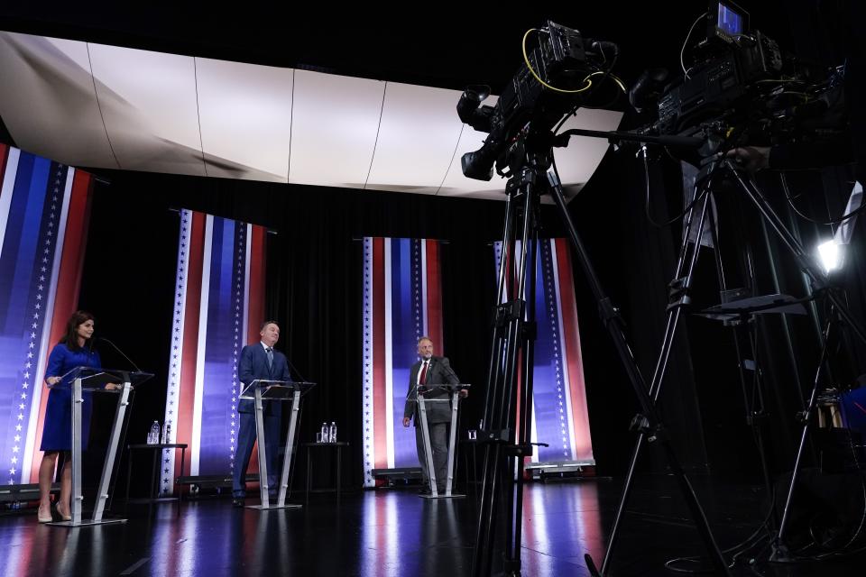 From left, Rebecca Kleefisch, Tim Michels and Timothy Ramthun participate in a televised Wisconsin Republican gubernatorial debate Sunday, July 24, 2022, in Milwaukee. (AP Photo/Morry Gash)