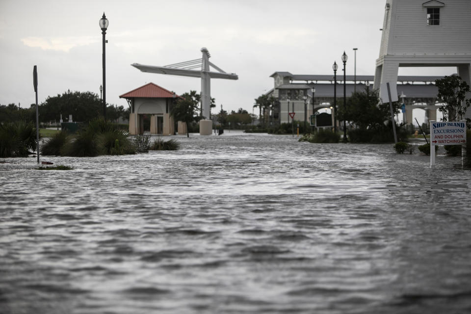 Jones Park in Gulfport, Mississippi, is flooded early Sunday, Aug. 29, 2021, from Hurricane Ida's storm surge ahead of the storm's landfall.  (Justin Mitchell / The Sun Herald via AP)