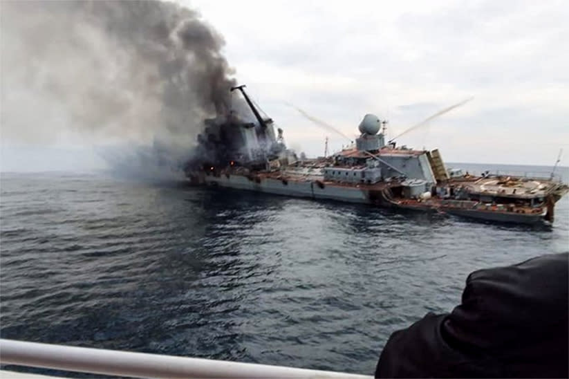 Smoke billows from the damaged Russian ship Moskva on April 15, 2022. (OSINT Technical via Twitter)