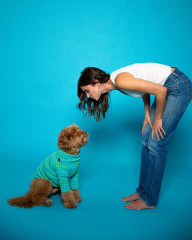 <p>Courtesy of Tate & Taylor</p> Taylor Hill and her dog, Tate, for Tate & Taylor