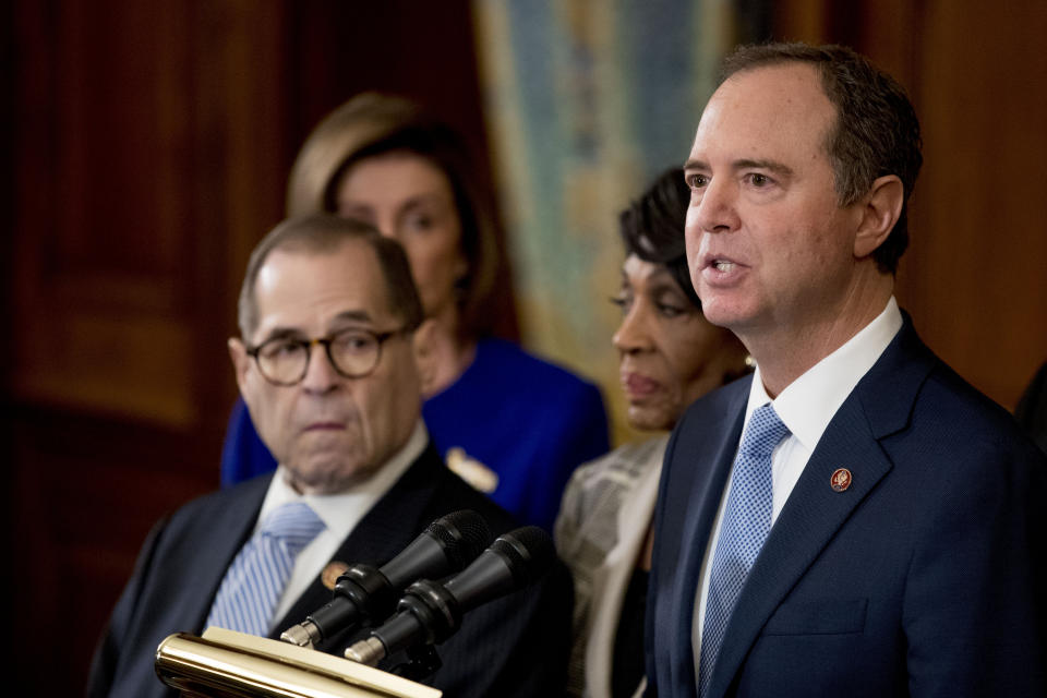 Rep. Adam Schiff, D-Calif., Chairman of the House Intelligence Committee, right, speaks with from left Chairman of the House Judiciary Committee Jerrold Nadler, D-N.Y., House Speaker Nancy Pelosi and Chairwoman of the House Financial Services Committee Maxine Waters, D-Calif., second from right, during a news conference to unveil articles of impeachment against President Donald Trump, abuse of power and obstruction of Congress, Tuesday, Dec. 10, 2019, on Capitol Hill in Washington. (AP Photo/Andrew Harnik)