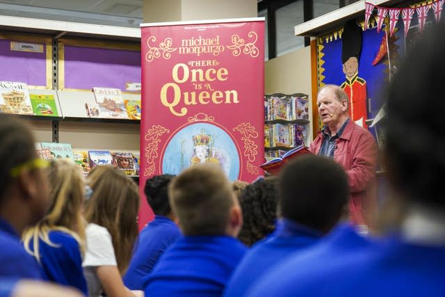 Children listen as Michael Morpurgo reads from his new book