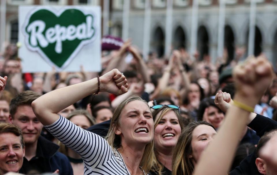 People celebrate the vote to repeal the effective ban on abortions in Ireland in 2018 (Brian Lawless/PA) (PA Archive)