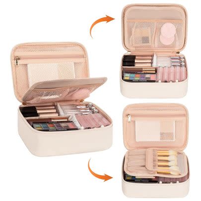 A soft-sided case with a flip-up removable brush organizer