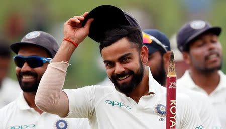 Cricket - Sri Lanka v India - Third Test Match - Pallekele, Sri Lanka - August 14, 2017 - India's captain Virat Kohli celebrates after they won the match and test cricket series against Sri Lanka. REUTERS/Dinuka Liyanawatte/Files