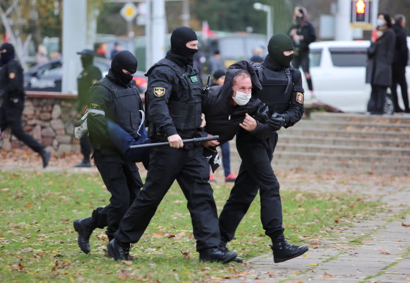 Belarusian opposition supporters hold a rally in Minsk