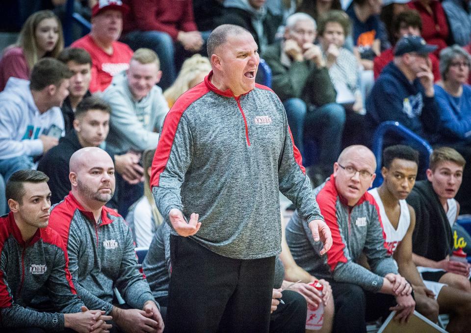 Wapahani's Matt Luce coaches against Delta during the Delaware County Basketball Tournament at Delta High School Tuesday, Jan. 8, 2019.