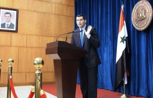 Syrian foreign ministry spokesman Jihad al-Makdissi addresses journalists in Damascus. The UN Security Council held an emergency meeting Sunday on the situation in Syria, hearing that the toll from a massacre in the town of Houla had risen to 108 dead and 300 injured