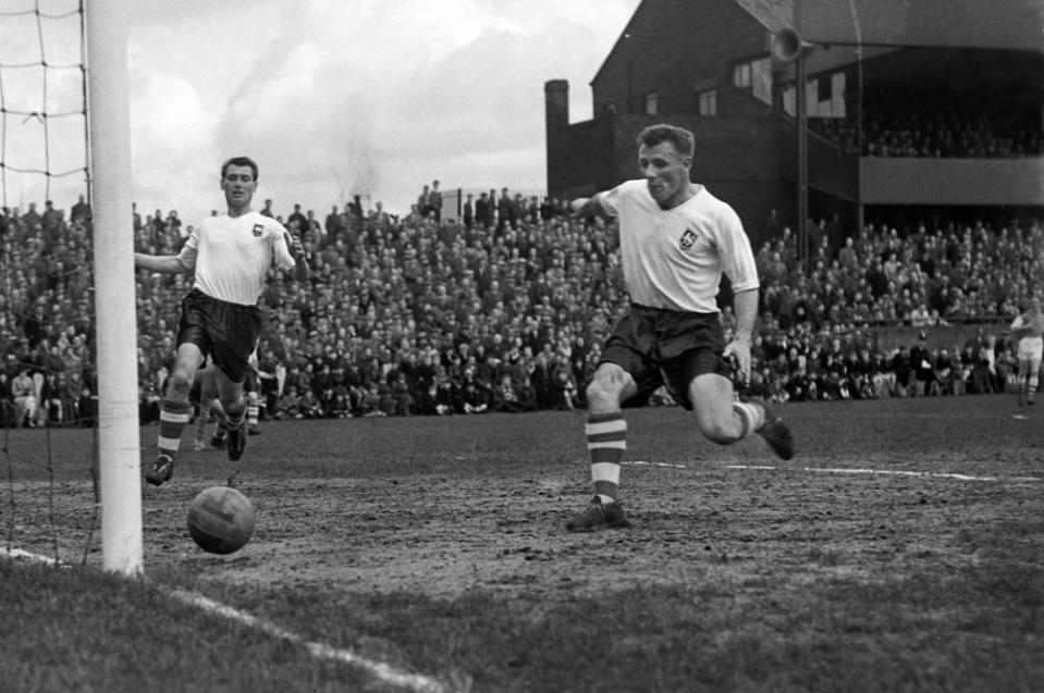 Tommy Docherty, right, in action for Preston North End against Arsenal in 1958.