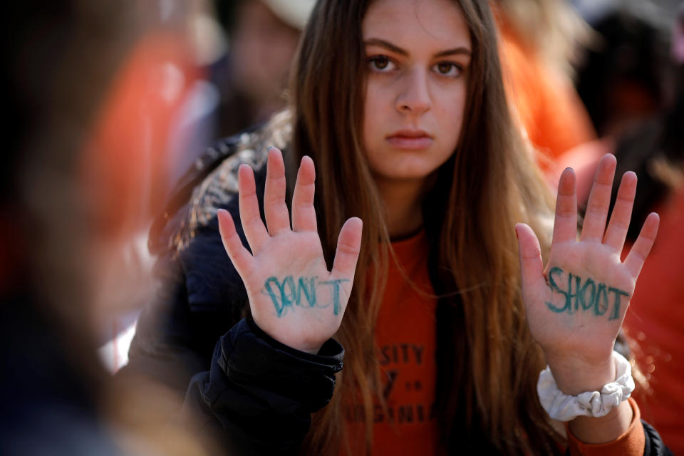 <p>A student attends a rally outside the White House as part of nationwide walk-outs of classes to mark the 19th anniversary since the Columbine High School mass shooting, at Lafayette Park in Washington, D.C., April 20, 2018. (Photo: Carlos Barria/Reuters) </p>