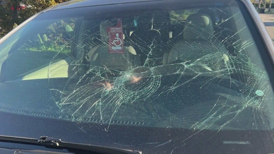 The smashed windshield of a Toyota minivan targeted by the suspect in Burbank on April 2, 2024. (Madai Bautista)