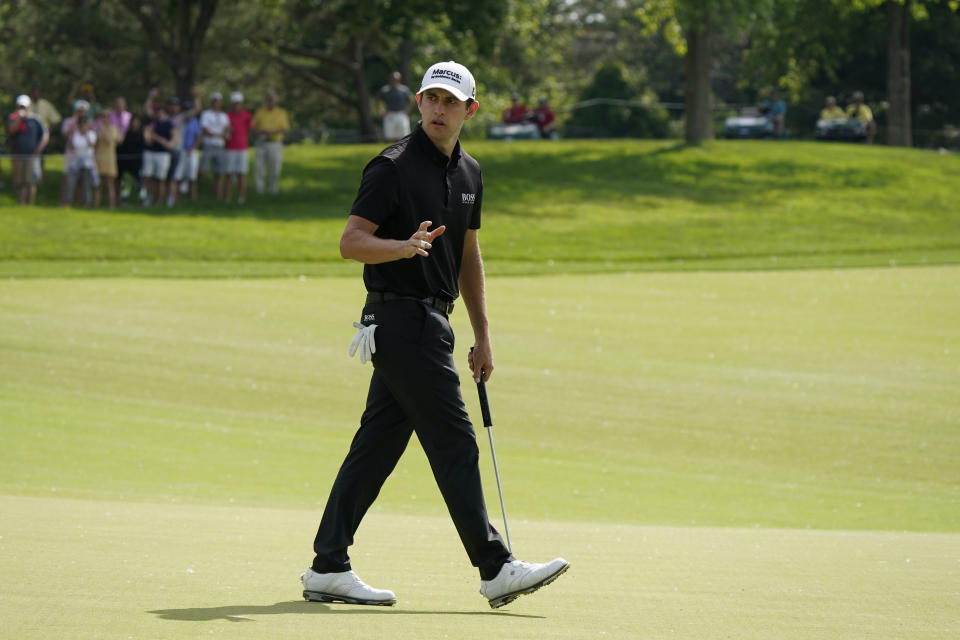 Patrick Cantlay reacts after making a birdie on the 13th hole during the final round of the Memorial golf tournament, Sunday, June 6, 2021, in Dublin, Ohio. (AP Photo/Darron Cummings)