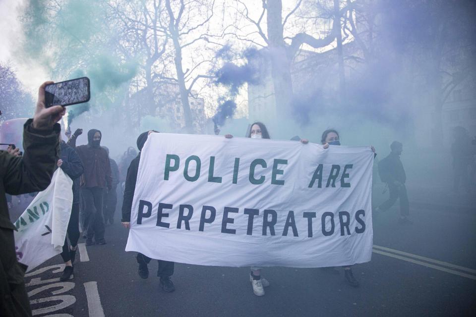 Activists attend a protest, called by Sisters Uncut, outside Scotland Yard, where they blocked the road before marching towards the West End, March 12, 2022 in London, United Kingdom. / Credit: Rasid Necati Aslim/Anadolu Agency/Getty