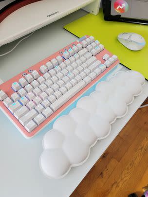 A dreamy, splurge-worthy Logitech wireless mechanical keyboard with an adorable cloud wrist rest