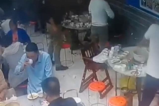 Huge ball of fire bursts out of cigarette as Chinese man lights it in restaurant with gas leak