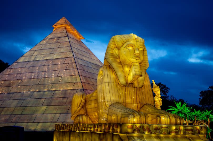 Visitors can walk through an Egyptian pyramid as they wander around the interactive and immersive lantern trail at Longleat's Festival of Lights -Credit:Lloyd Winters