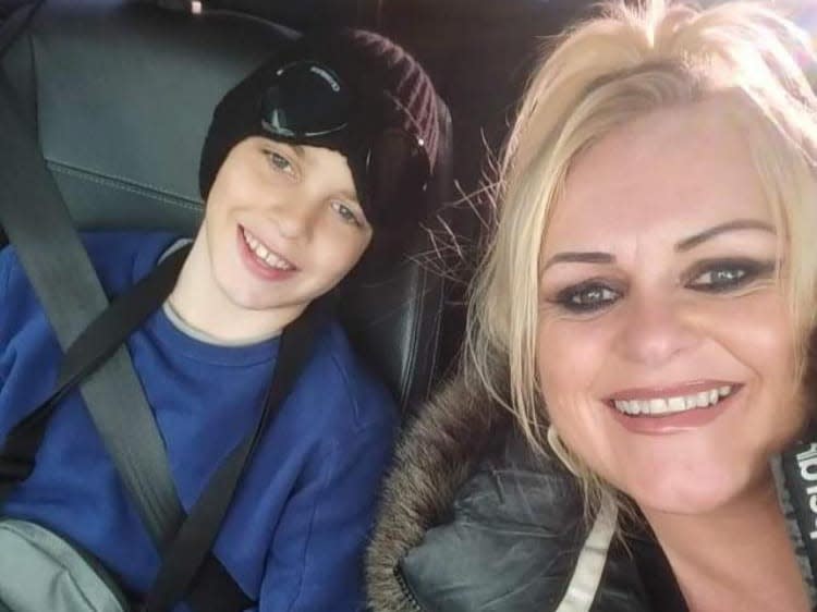 Archie Battersbee poses in a selfie in a car with his mother, Hollie Dance.