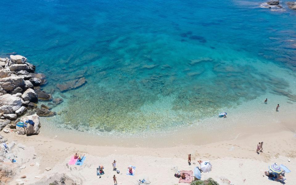 aerial view of beach with few people - Michele Falzone /Photodisc