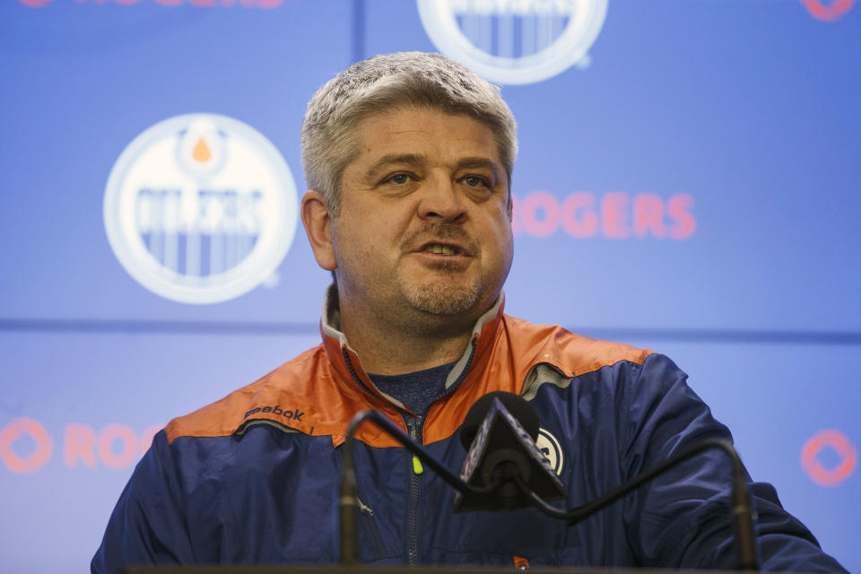 FILE - In this May 12, 2017, file photo, Edmonton Oilers head coach Todd McLellan speaks to the media during an NHL hockey news conference in Edmonton, Alberta. The Edmonton Oilers have fired coach Todd McLellan and replaced him with Ken Hitchcock with the team languishing in sixth place in the Pacific Division. McLellan was in his fourth season behind the Oilers' bench. The team missed the playoffs in two of his previous three seasons despite having superstar Connor McDavid on its roster. The Oilers were just 9-10-1 entering its game Tuesday night, Nov. 20, 2018, at San Jose. (Jason Franson/The Canadian Press via AP, File)