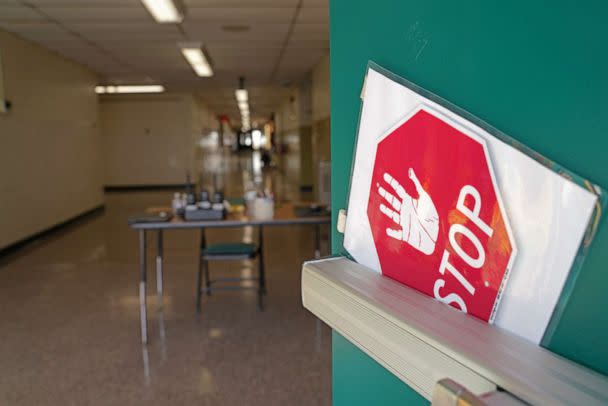 PHOTO: A side door warns visitors to stop at Richneck Elementary School, Jan. 7, 2023, in Newport News, Va. (Jay Paul/Getty Images)