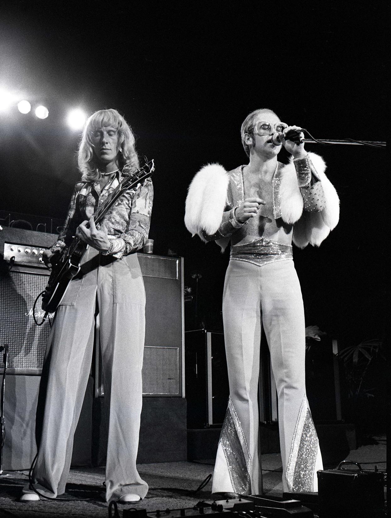 Davey Johnstone and Elton John in 1974. (Photo: Robert Knight Archive/Redferns)