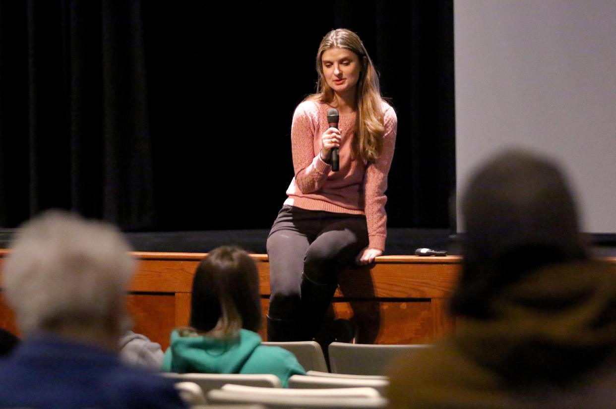 Alicia "Kozak" Kozakiewicz, founder of the advocacy group Alicia Project, speaking to parents inside the West Branch High School auditorium on online safety and sextortion Tuesday, March 21, 2023. At 13, she survived an abduction. Ed Hall Jr, Special To The Review