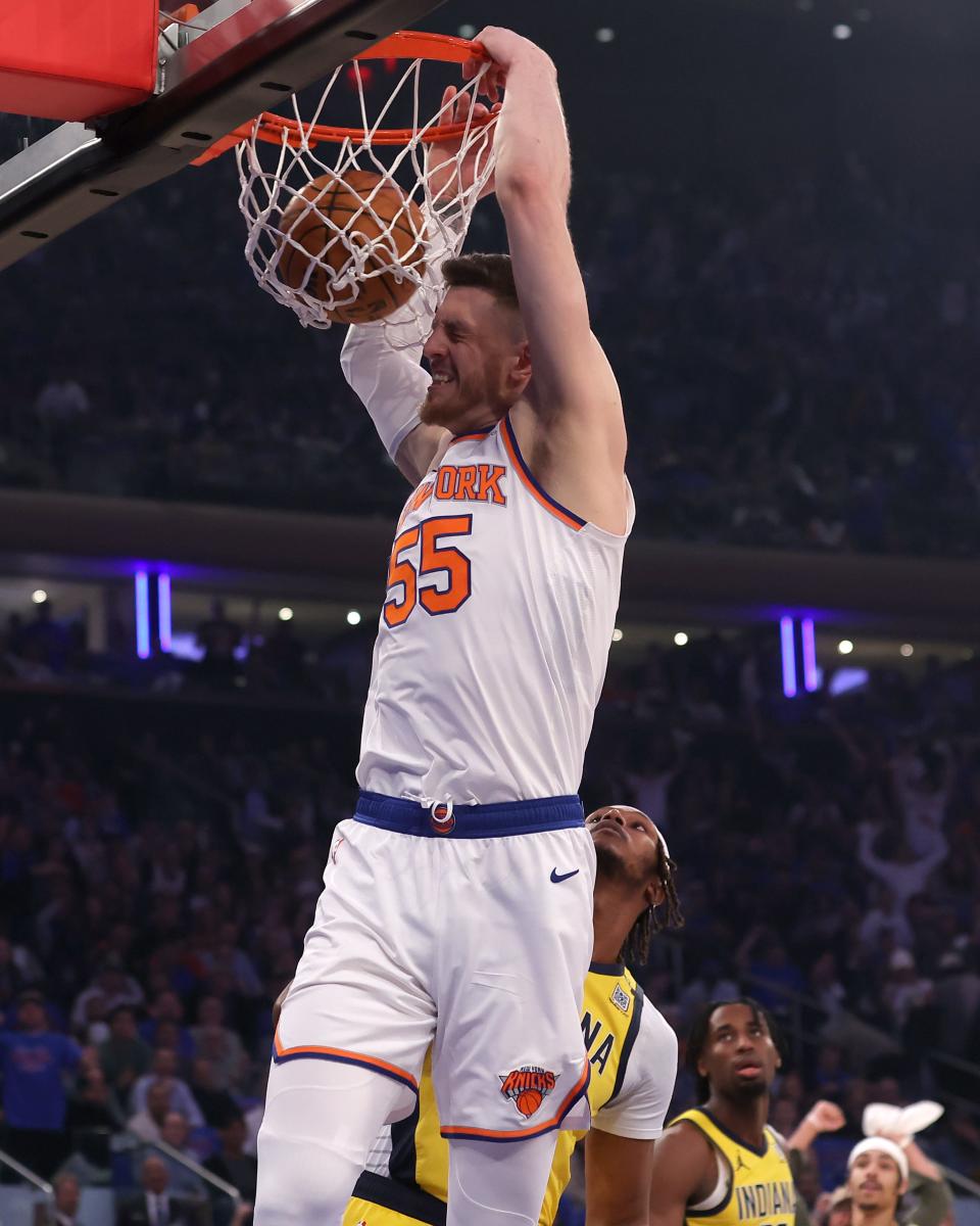 May 6, 2024; New York, New York, USA; New York Knicks center Isaiah Hartenstein (55) dunks against Indiana Pacers center Myles Turner (33) during the first quarter of game one of the second round of the 2024 NBA playoffs at Madison Square Garden. Mandatory Credit: Brad Penner-USA TODAY Sports