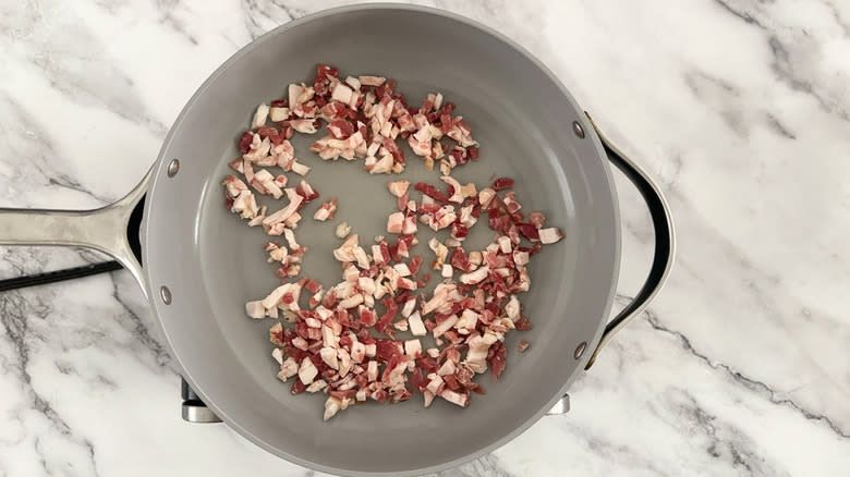 diced pancetta in frying pan