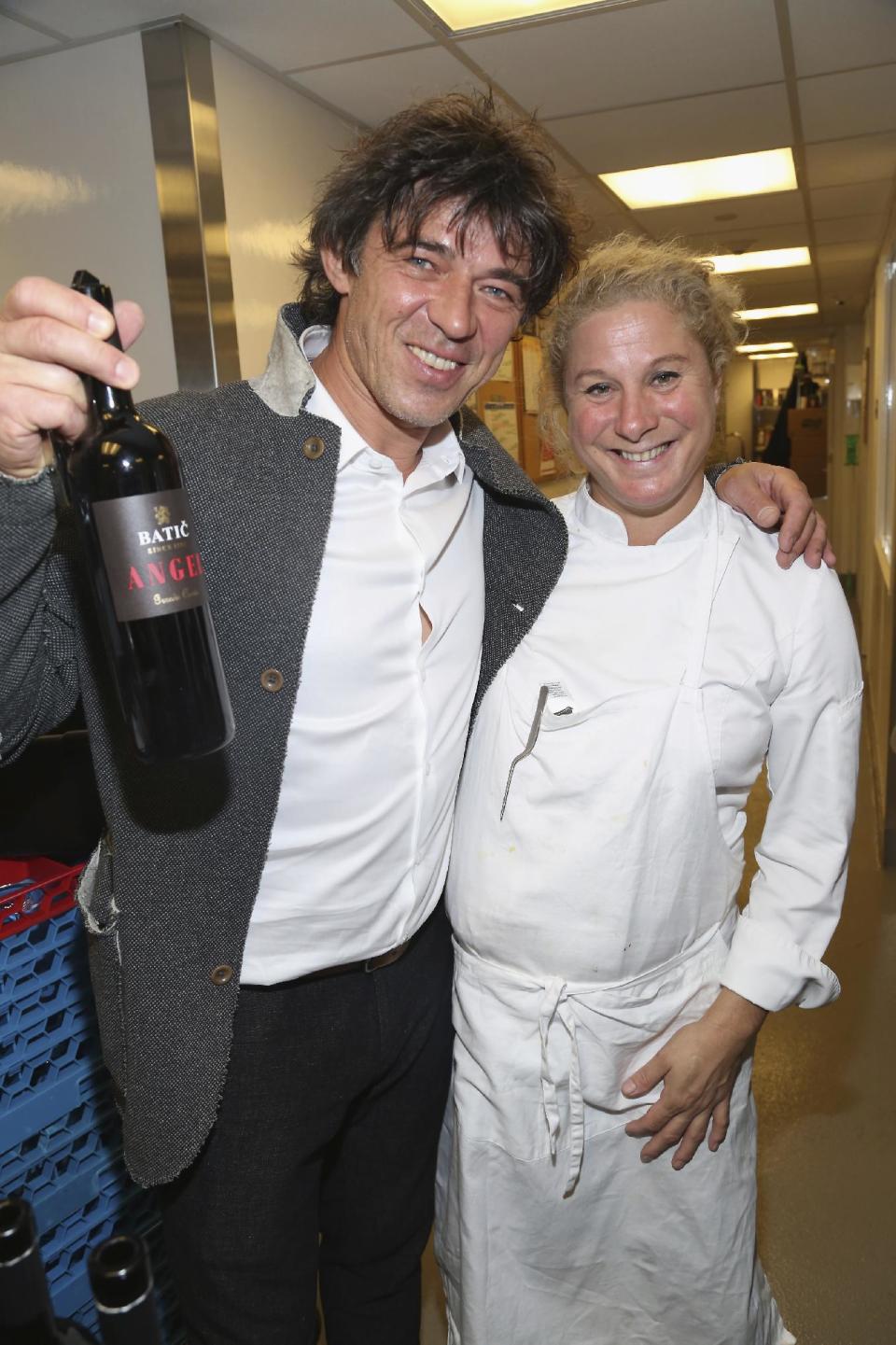 This Oct. 20, 2016 photo provided by the Slovenia Tourist Board shows Valter Kramar and his wife, chef Ana Ros, at an event in showcasing her culinary repertoire in New York. Ros heads the kitchen in a remote village inn in Slovenia called Hisa Franko that Kramar inherited from his father. Ros starred in an episode of the Netlix "Chef's Table" series. The New York City event also touted other attractions in Slovenia, where tourism has been growing. (Patrick McMullan Photography/Slovenia Tourist Board via AP)