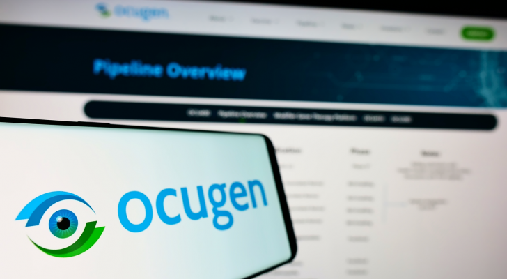 Smartphone with logo of US biopharmaceutical company Ocugen Inc (OCGN) on screen in front of website Focus on left of phone display