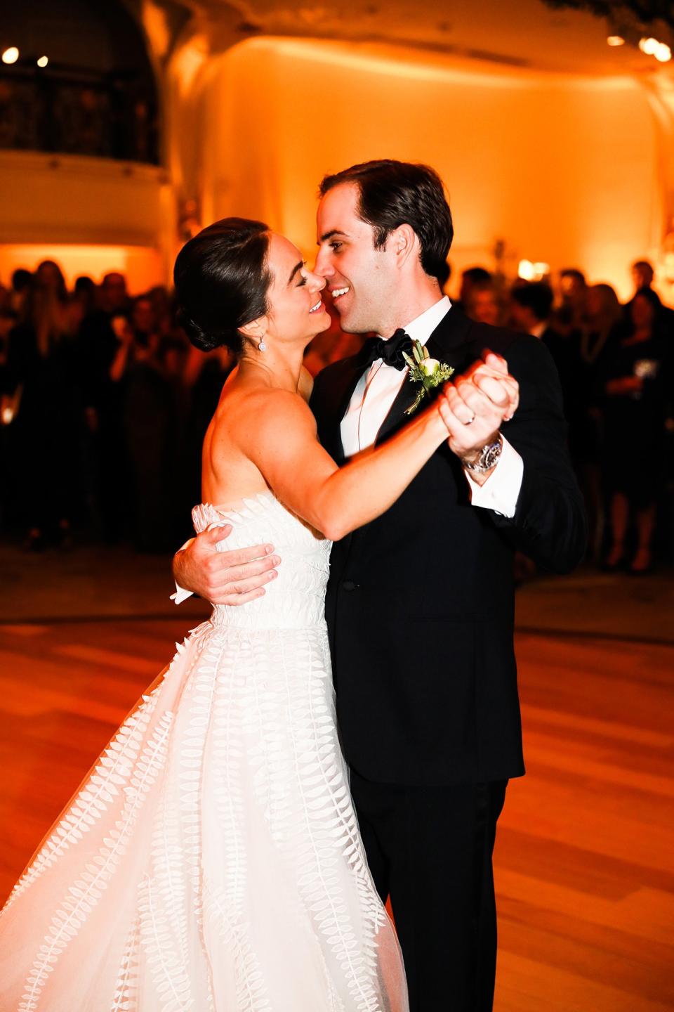 The bride wore Oscar de la Renta, inspired by her grandmother, for her greenery-filled ceremony at the Beverly Hills Hotel.