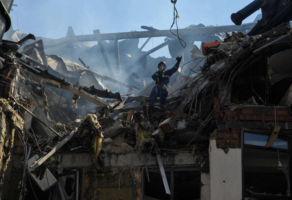 Rescuers work on a residential building damaged by a Russian missile strike in Kyiv, Ukraine, June 26, 2022. / Credit: Sergei Chuzavkov/SOPA Images/LightRocket/Getty