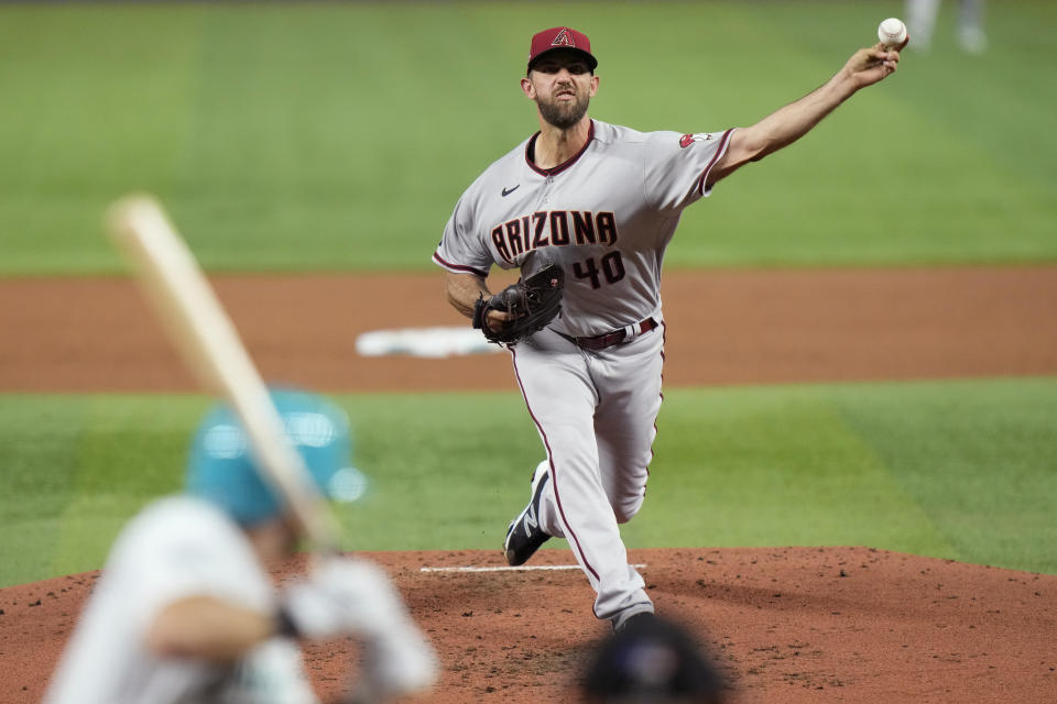 Arizona Diamondbacks starting pitcher Madison Bumgarner throws during the third inning of a baseball game against the Miami Marlins, Friday, April 14, 2023, in Miami. (AP Photo/Lynne Sladky)