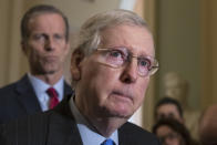 Senate Majority Leader Mitch McConnell, R-Ky., joined at left by Sen. John Thune, R-S.D., the Republican Conference chairman, speaks to reporters about the possibility of a partial government shutdown, at the Capitol in Washington, Tuesday, Dec. 18, 2018. Congress and President Donald Trump continue to bicker over his demand that lawmakers fund a wall along the U.S.-Mexico border, pushing the government to the brink of a partial shutdown at midnight Friday. (AP Photo/J. Scott Applewhite)