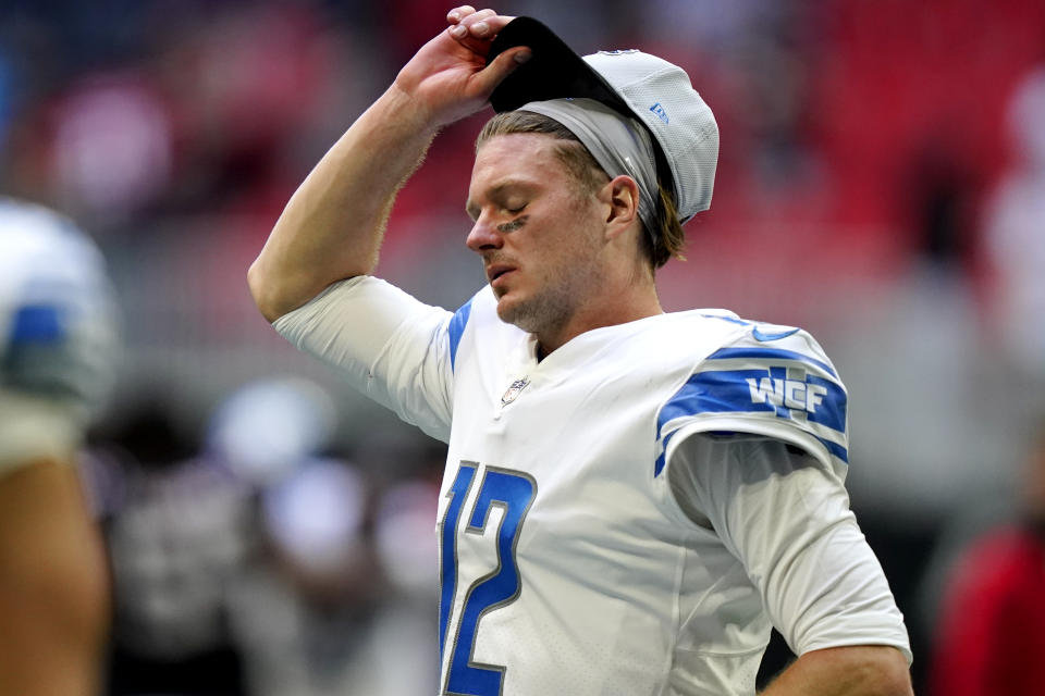 Detroit Lions quarterback Tim Boyle walks off the field after an NFL football game against the Atlanta Falcons, Sunday, Dec. 26, 2021, in Atlanta. The Atlanta Falcons won 20-16. (AP Photo/Brynn Anderson)