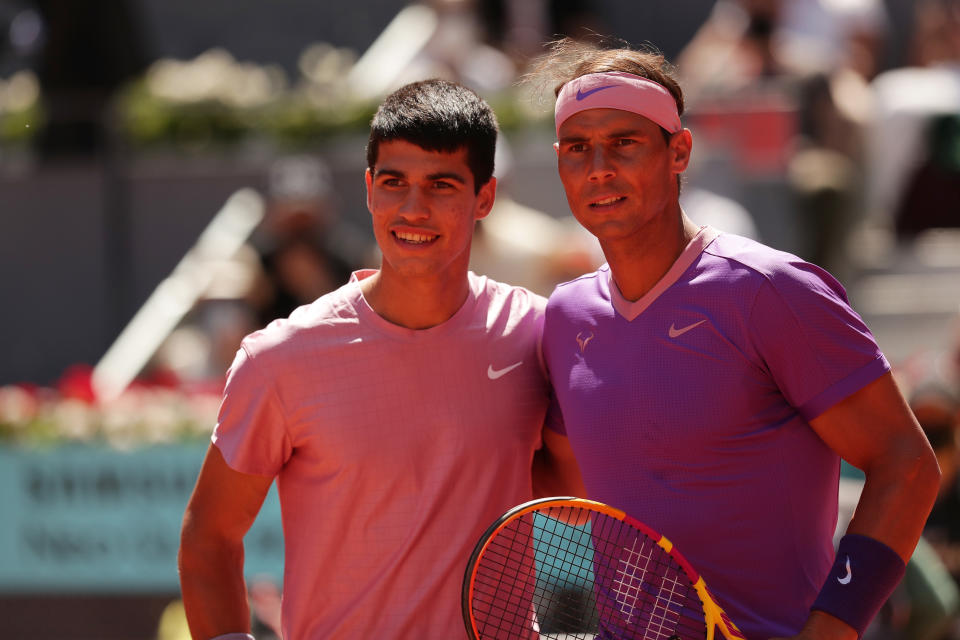 MADRID, SPAIN - MAY 05: Rafael Nadal of Spain and Carlos Alcaraz of Spain pose for a picture before their second round match during day seven of the Mutua Madrid Open at La Caja Magicaon May 05, 2021 in Madrid, Spain. (Photo by Gonzalo Arroyo Moreno/Getty Images)