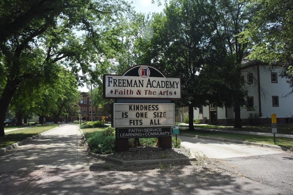 The boulevard leading to the Freeman Academy in Freeman, South Dakota as it stands on Friday, Aug. 25, 2023. A sign bears the message, "Kindness is one size fits all."