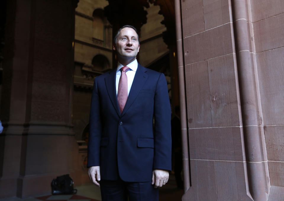 FILE - In this Jan. 22, 2014 file photo, Westchester County Executive Rob Astorino poses for photos at the state Capitol in Albany, N.Y. Astorino, a Republican, says he'll announce Wednesday March 5, 2014 whether he's challenging Andrew Cuomo for governor of New York. Astorino tweeted that he'll reveal his decision in a "video news release." (AP Photo/Mike Groll, File)