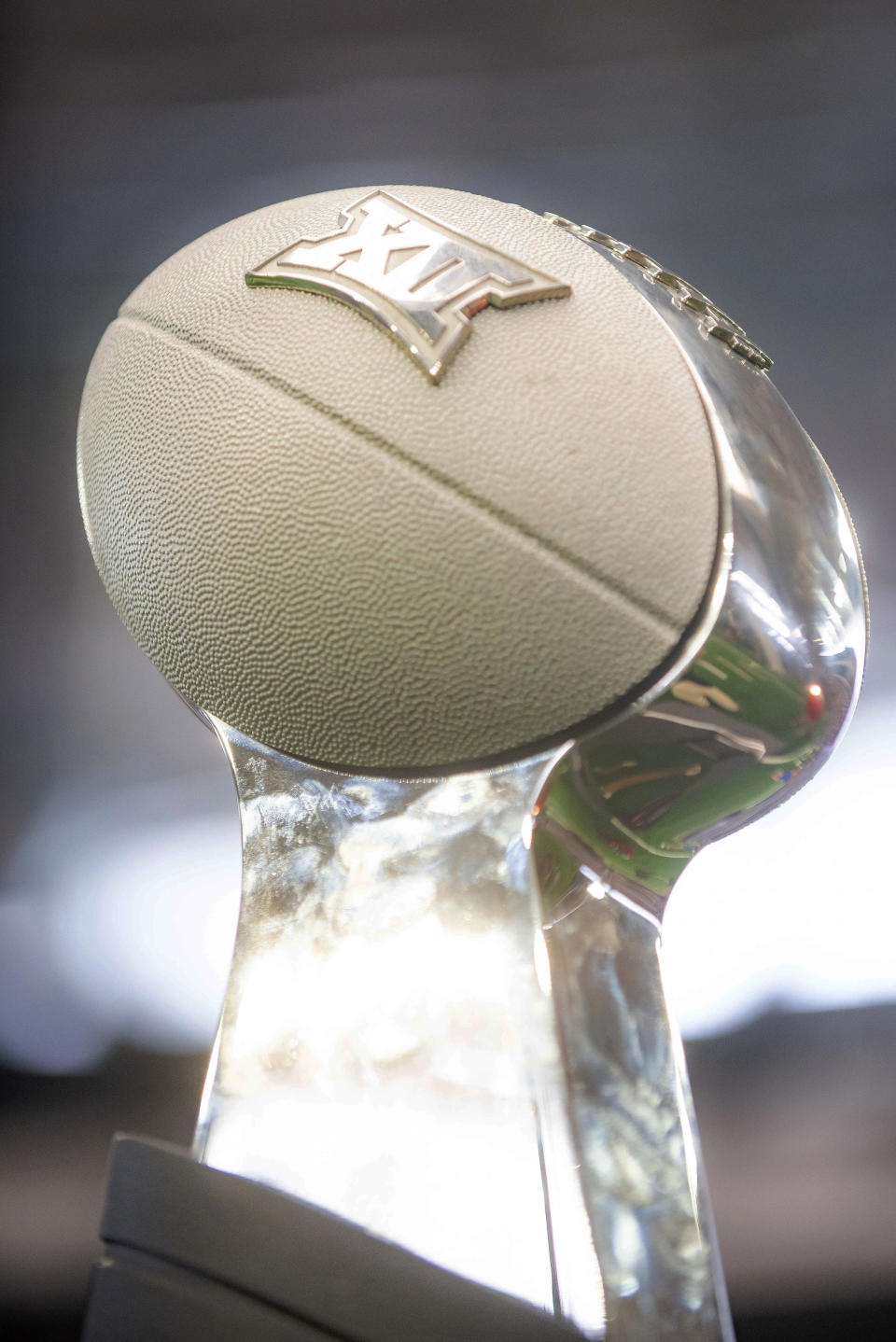 The Big 12 Championship Trophy stands on display during the conference's football media days in Arlington, Texas, Thursday, July 13, 2023. (AP Photo/Emil T. Lippe)