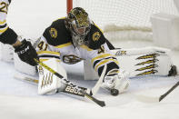 Boston Bruins goaltender Jaroslav Halak makes a save during the second period of an NHL hockey game against the Florida Panthers, Thursday, March 5, 2020, in Sunrise, Fla. (AP Photo/Wilfredo Lee)