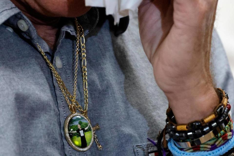 Robert Moberg, wears a pendant bearing a photograph of his son, Corbin, during a news conference at the Broward Public Defender’s Office in Fort Lauderdale on Thursday, Feb. 1, 2024. On January 1, 2024, Corbin Moberg, who had been at the Broward County Jail for two and a half years on drug related offenses, died of an alleged drug overdose. According to Public Defender Gordon Weekes, there have been 21 deaths in the jail since 2019. The NAACP has asked the Department of Justice to look into the incidents. (Amy Beth Bennett / South Florida Sun Sentinel)