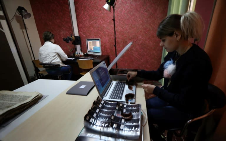 A woman works at the Oriental Manuscript Digitisation Centre (CNDO) in Arbil, the capital of Iraq's autonomous northern Kurdish region