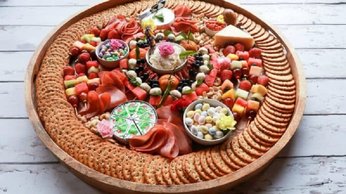 <p>Reluctant Entertainer</p><p>An epic spring charcuterie board filled with cured meats, cheese, fruit kebabs and spring blossoms! Arrange on an epic board, with favorite pastel colors.</p><p><strong>Get the recipe: </strong><a href="https://reluctantentertainer.com/epic-spring-charcuterie-board/" rel="nofollow noopener" target="_blank" data-ylk="slk:Epic Spring Charcuterie Board;elm:context_link;itc:0;sec:content-canvas" class="link rapid-noclick-resp"><strong>Epic Spring Charcuterie Board</strong></a></p>