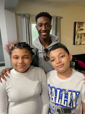 Coko Gamble's son poses with her cousin's 12-year-old twins.