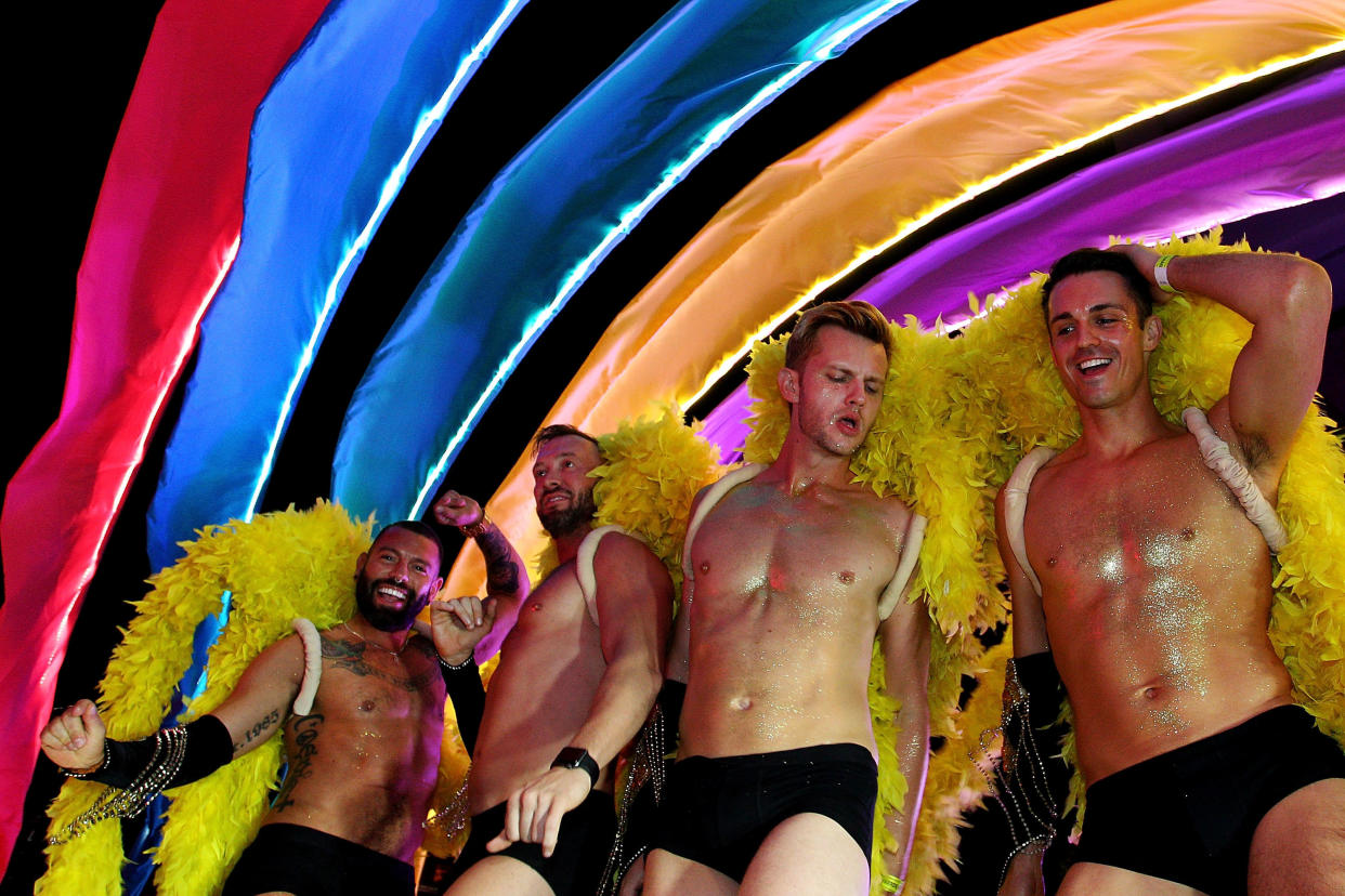 Parade goers celebrate during the 2018 Sydney Gay &amp; Lesbian Mardi Gras Parade on March 3, 2018 in Sydney, Australia. The Sydney Mardi Gras parade began in 1978 as a march and commemoration of the 1969 Stonewall Riots of New York. It is an annual event promoting awareness of gay, lesbian, bisexual and transgender issues and themes. (Photo: Lisa Maree Williams via Getty Images)