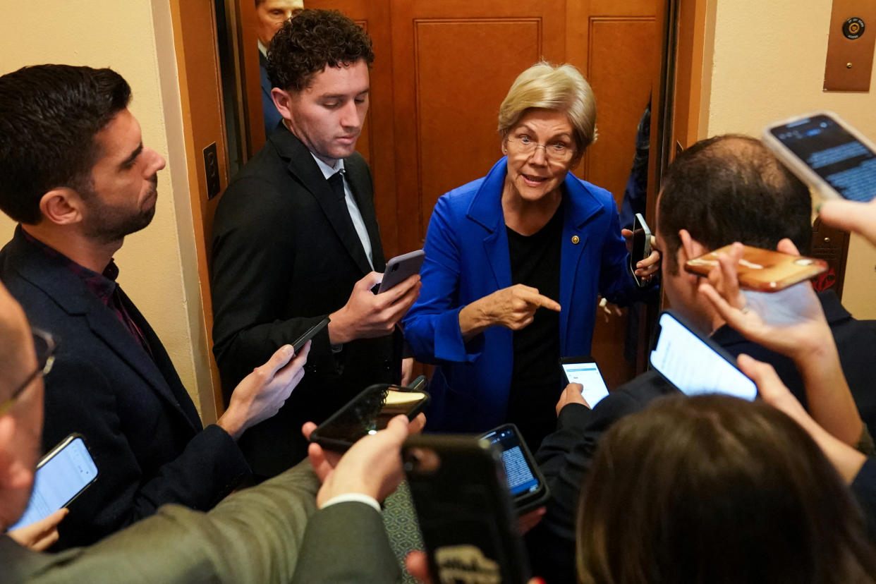 U.S. Senator Elizabeth Warren (D-MA) speaks to reporters before attending the weekly Democratic caucus luncheon at the U.S. Capitol in Washington, D.C., U.S., November 29, 2022. REUTERS/Sarah Silbiger